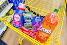 crush, persil, gillette, venus, colgate products in a dollar general shopping cart