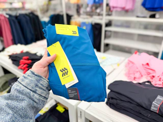 hand holding all in motion leggings at Target