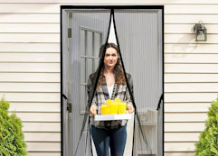 a woman coming through a ma