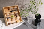 Lifestyle image of the Better Homes & Gardens Glass Jar Set in Bamboo Shelf