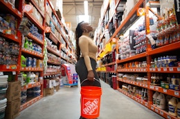 A woman looking at light figures.