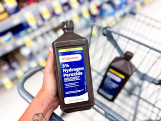 hand holding walgreens brand peroxide