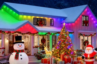 lemonlovely 100FT Permanent Outdoor Lights on a house during the winter.