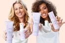 two women holding Keranique products