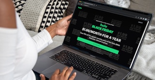 A person looking at the Hulu website showing their deal of a $1.99 monthly subscription deal Black Friday 2022