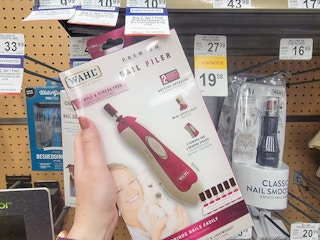 hand holding a pink Wahl premium nail filer for pets