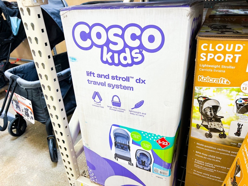 Cosco Lift N Stroll Travel System on walmart floor