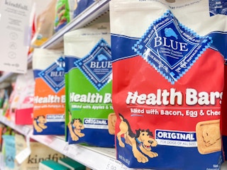 A variety of Blue Buffalo Health Bars sitting on a store shelf.