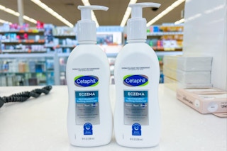 two bottles of moisturizer on store beauty counter