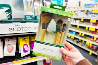 hand holding ecotools makeup brush set at cvs