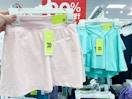hand holding all-in-motion-kids-shorts at target