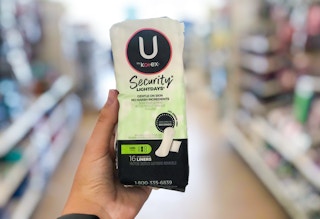 u by kotex security lightdays liners held up in front of window