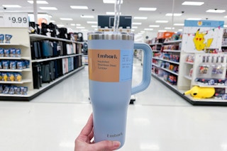 hand holding a light blue 40-ounce tumbler at Target