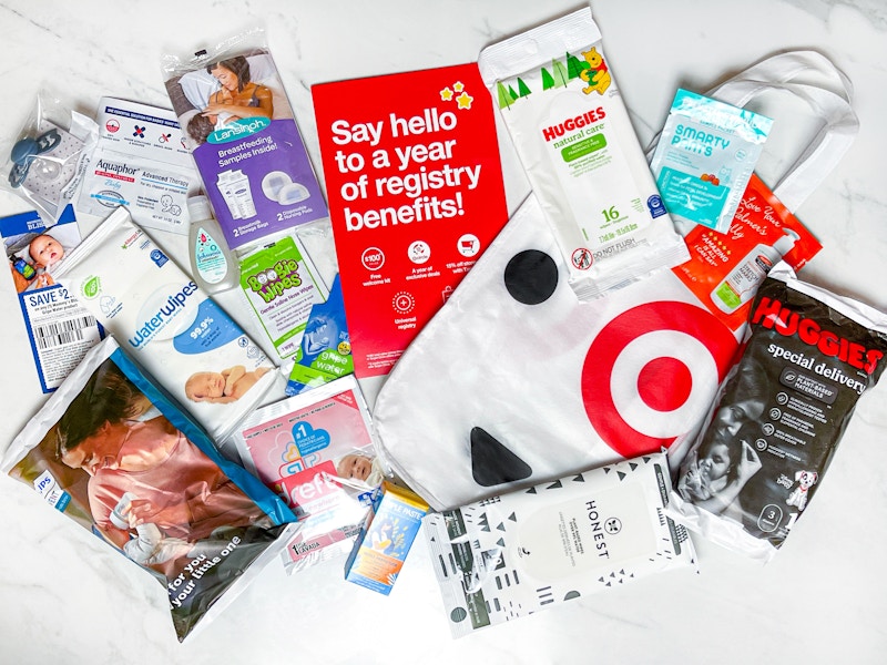 a target baby registry welcome bag with the contents layed out on a counter