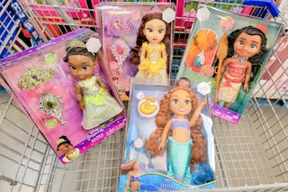 disney princess dolls in a cart