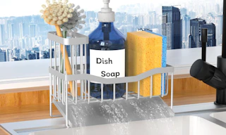 a metal sink caddy on a sink