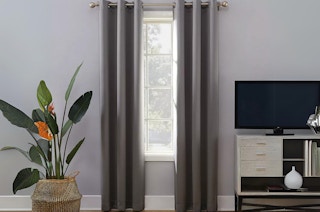 blackout curtains hanging in a room