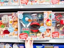 hand holding little tikes creative chefs kit on walmart shelf
