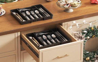 silverware in an organizer in a drawer