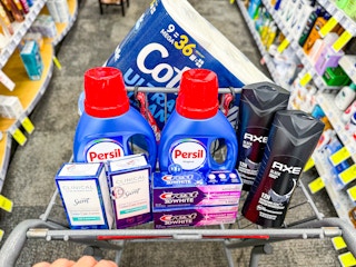 cvs shopping cart with persil, axe, secret, crest, axe, cottonelle