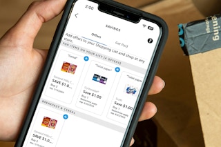 a cell phone being held with amazon alexia app on screen