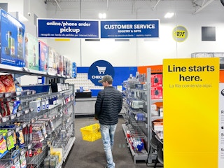 a person walking in the customer service line