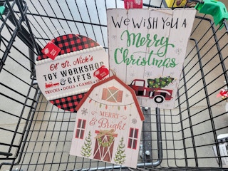 christmas wall decor in a cart