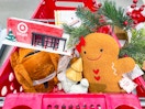 Target LED store front, turkey slippers, gingerbread plush, pine garland, and other trinket in a Target cart