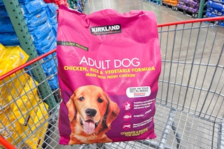 bag of dog food in cart