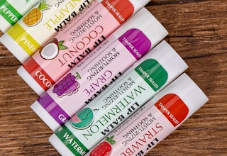 lip balm tubes on a wooden surface