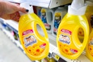 hand holding suavitel fabric softener