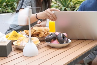 a fly fan on a picnic table