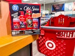 old spice gift set sitting on a table in front of parked target cart