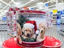 In store photo taken at Walmart of the puppy themed popcorn tins in shopping cart
