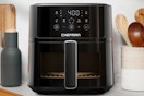 Chefman air fryer on a kitchen countertop.