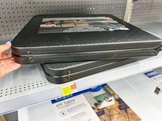 Black folding table on shelf in Walmart store