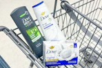dove body wash and bar soap in a cart