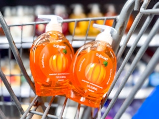 two bottles of hand soap in a shopping cart