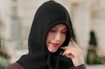 a woman using a balaclava