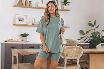 Lifestyle image of woman wearing the SUNBS 2 Piece Outfit for Women Lounge Set in light green 