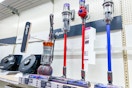 dyson vacuums sitting on a target shelf