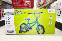 pacific kids' bike sitting on the floor in a target aisle