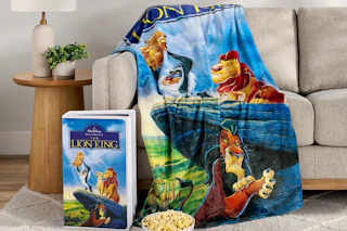 Disney throw blanket on a couch