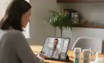 a woman on a video call with a doctor
