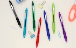 colorful pens and paper clips 