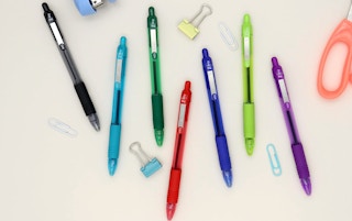 colorful pens and paper clips 