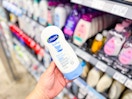Close up shot of Cetaphil baby wash held up in center aisle at Walmart
