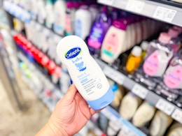 Close up shot of Cetaphil baby wash held up in center aisle at Walmart