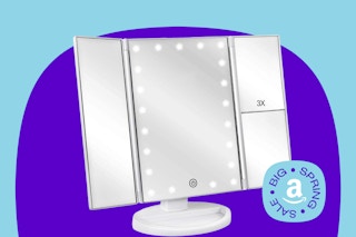 tri-fold vanity mirror with LED lights on a blue and purple background