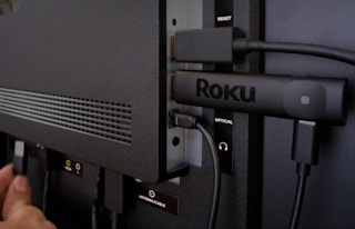 a Roku device plugged into a TV
